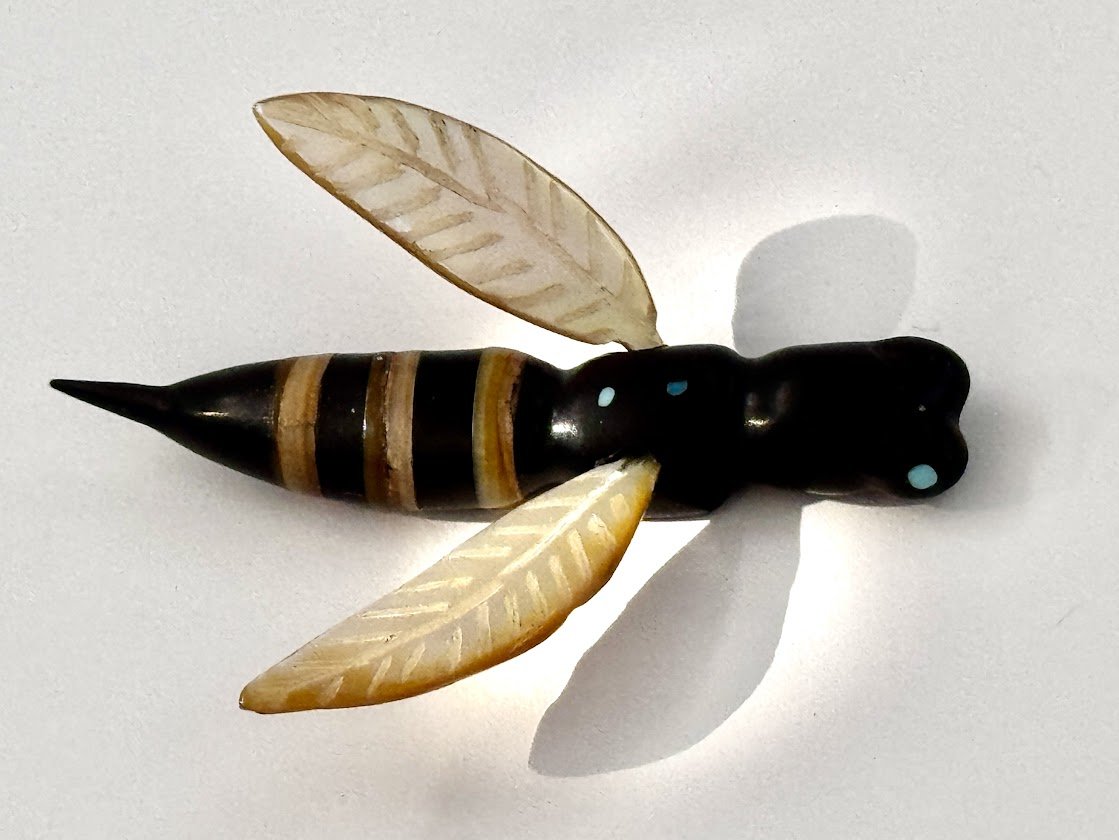 Zuni Spirits is proud to represent a variety of Zuni fetish carvers, including Justin Red Elk|JetJet & Gold-lipped Mother of pearlJet & Gold-lipped Mother of pearl Hornet sculpture!